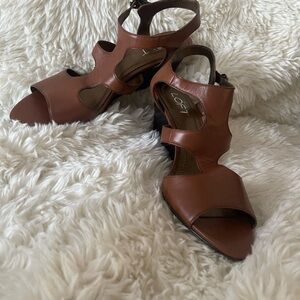 Brown wedge heels shoes.